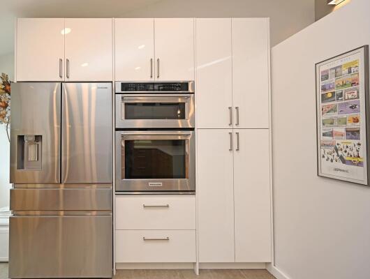 Framed appliances in Aya Cabinetry's Chelsea White High gloss
