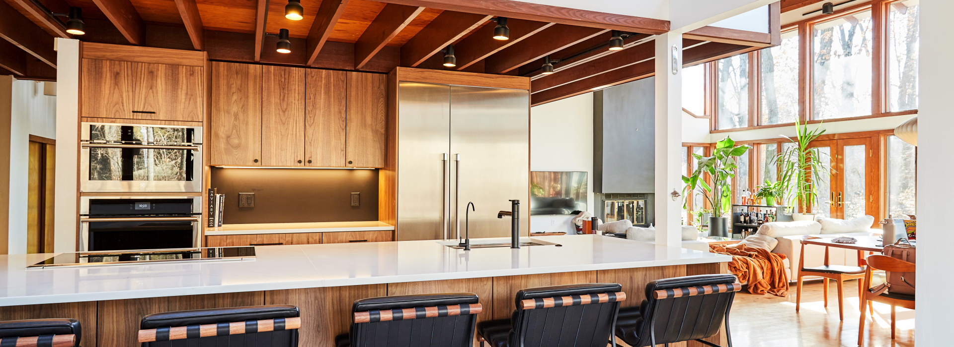 Modern Euro-style cabinets in fully furnished kitchen